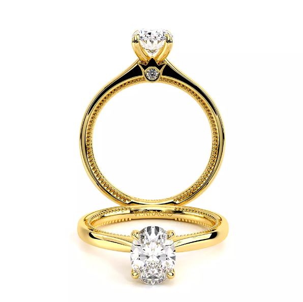 14K gold ring with solitaire diamond accents.