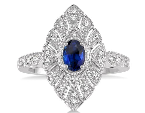 Oval sapphire ring with diamond accents.