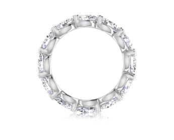 14K white gold band with pear diamonds.