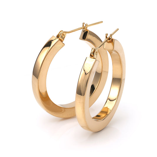14K yellow gold medium hoop earrings.