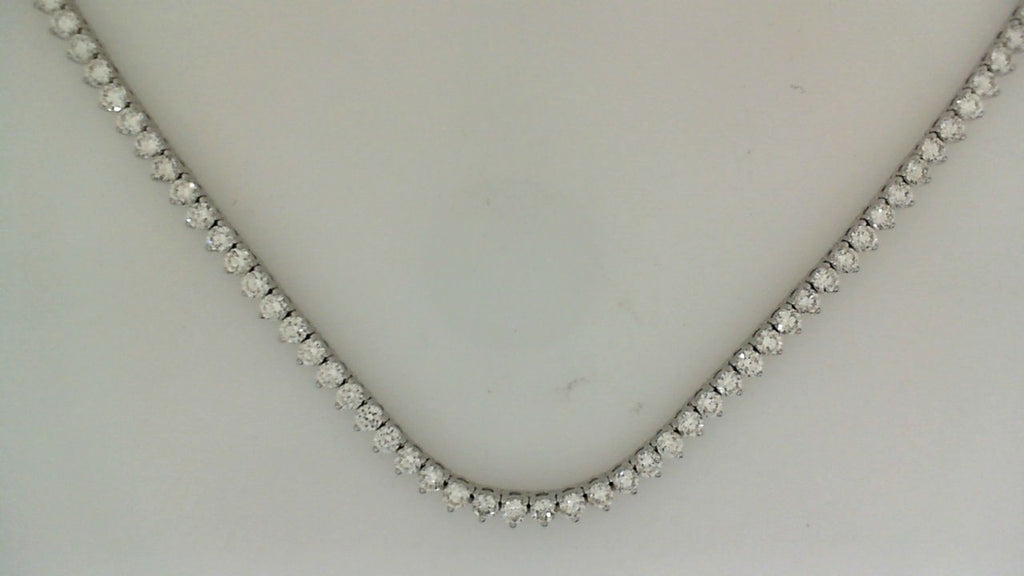 Round diamond tennis necklace in white gold.