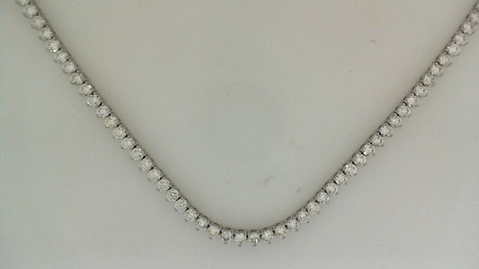 Round diamond tennis necklace in white gold.