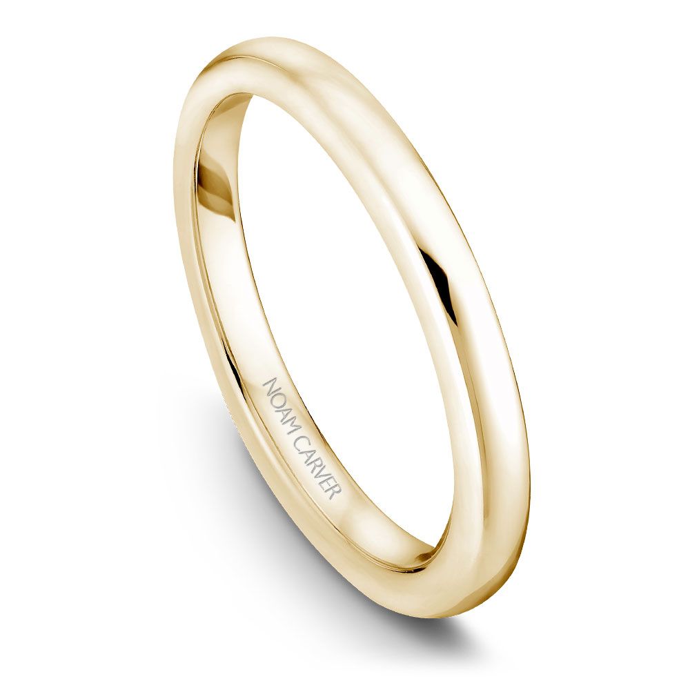 Polished yellow gold carved band ring.