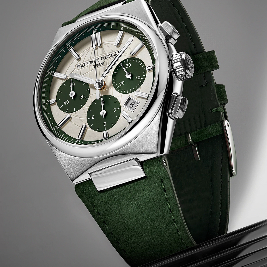 Green dial, stainless steel case, leather strap.
