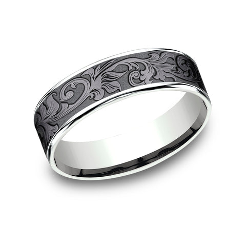 Tantalum carved band with intricate floral design.