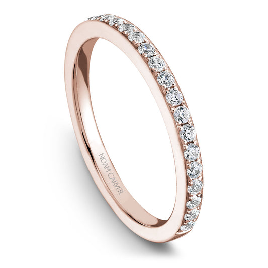 Rose gold band with round diamonds.
