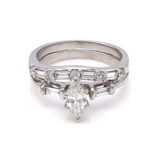 Marquise diamond halo wedding set in white gold.