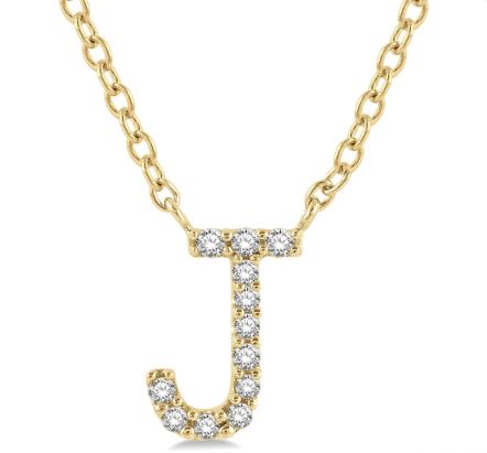 Yellow gold initial necklace with diamonds.