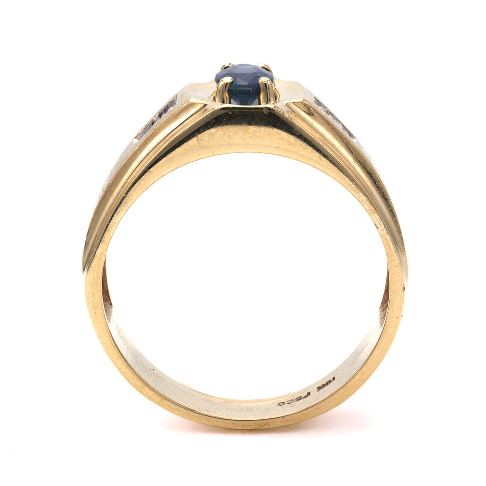 10K gold ring with oval sapphire.