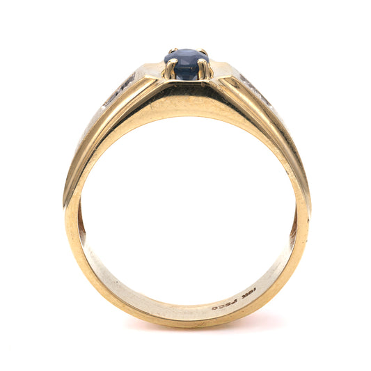 10K gold ring with oval sapphire.