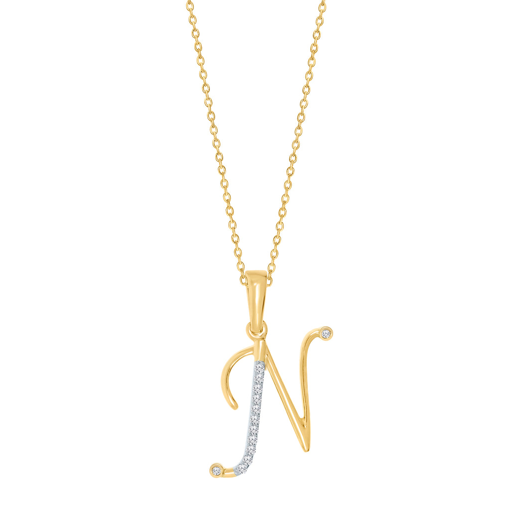 Yellow gold necklace with diamond initial pendant.
