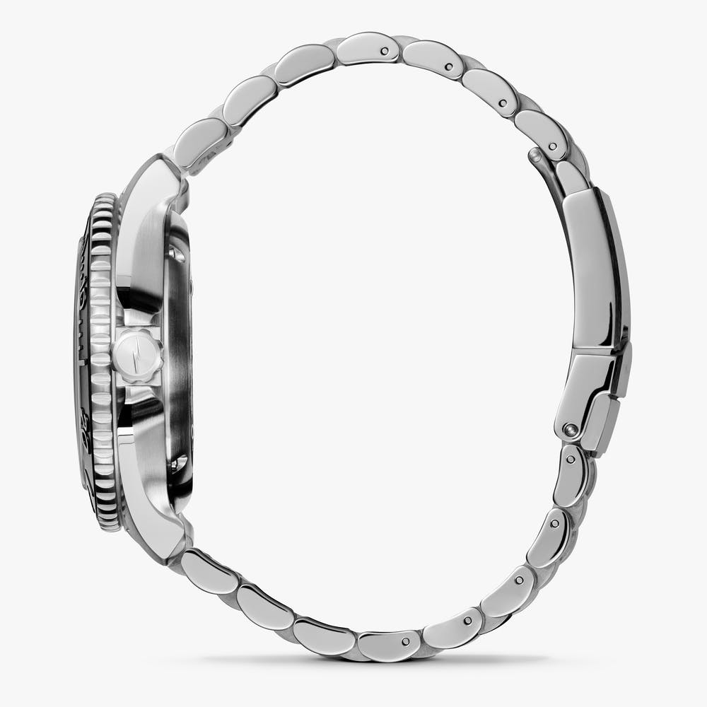 Stainless steel watch with side view.