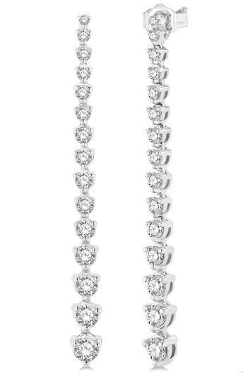 Elegant diamond drop earrings in white gold.
