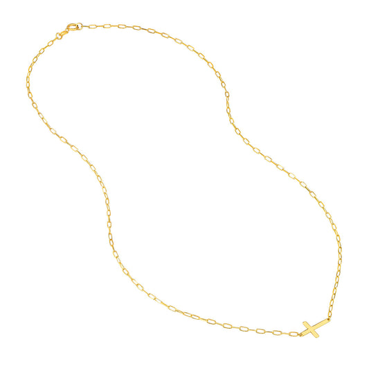 14K yellow gold cross necklace on chain.