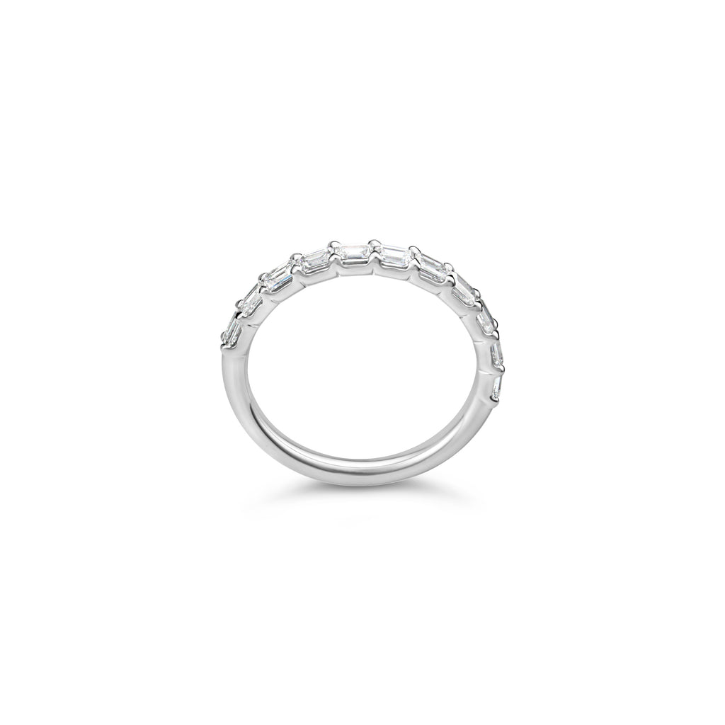 Emerald diamond band in white gold.