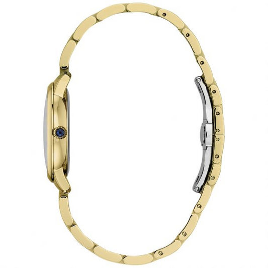 Gold watch with sapphire crown detail.
