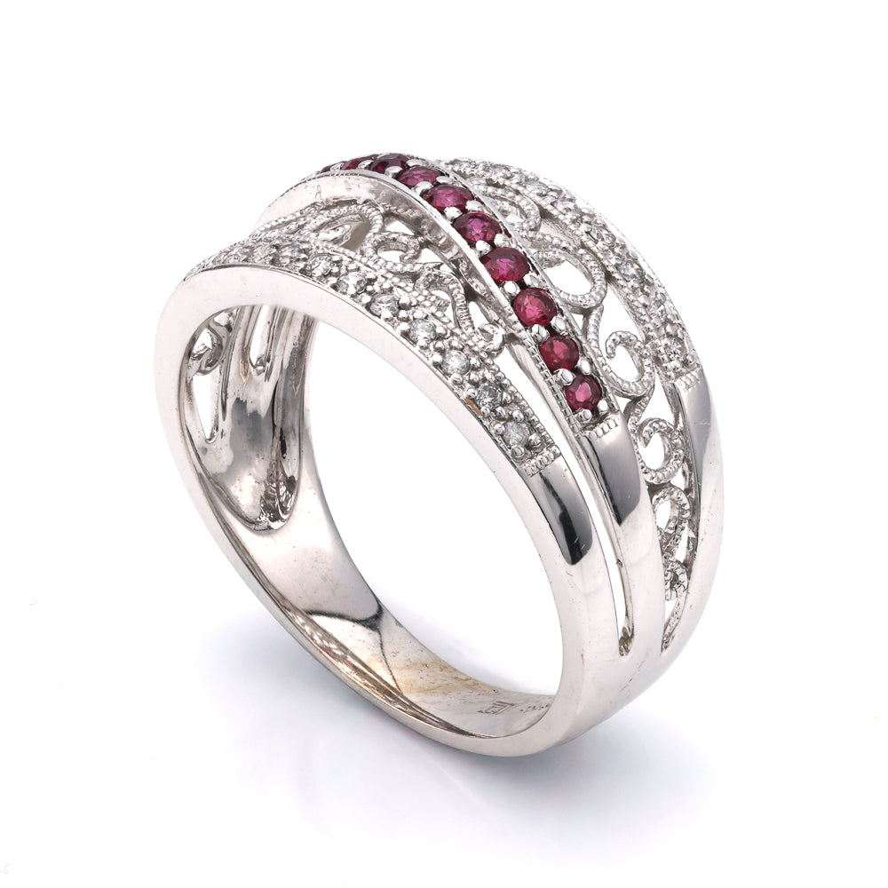 14K white gold ring with rubies, diamonds.