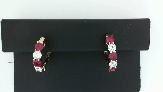 14K gold hoop earrings with rubies, diamonds.
