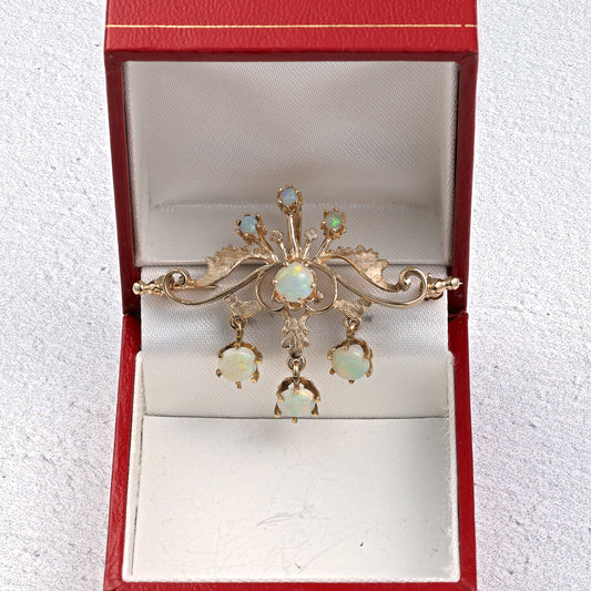 Opal bar pin with Florentine gold finish.