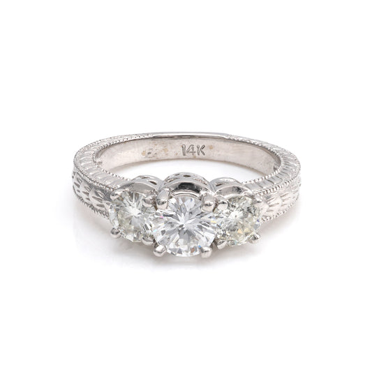 Three Stone Natural Diamond Complete Engagement Ring in 14 Karat White with 1 Round Diamond, Color: G/H, Clarity: I1, totaling 0.69ctw