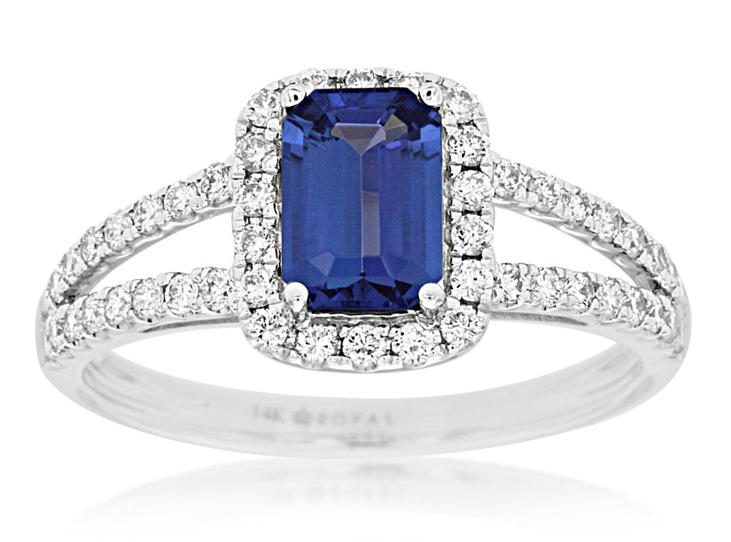 Emerald-cut tanzanite ring with diamond accents.