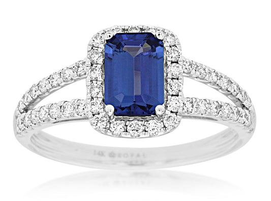 Emerald-cut tanzanite ring with diamond accents.
