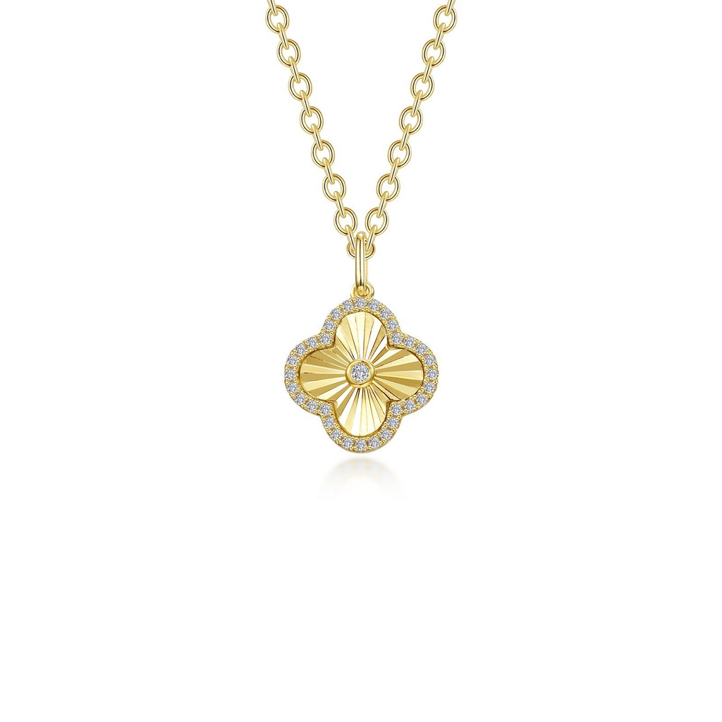 Clover-shaped yellow silver necklace with diamonds.