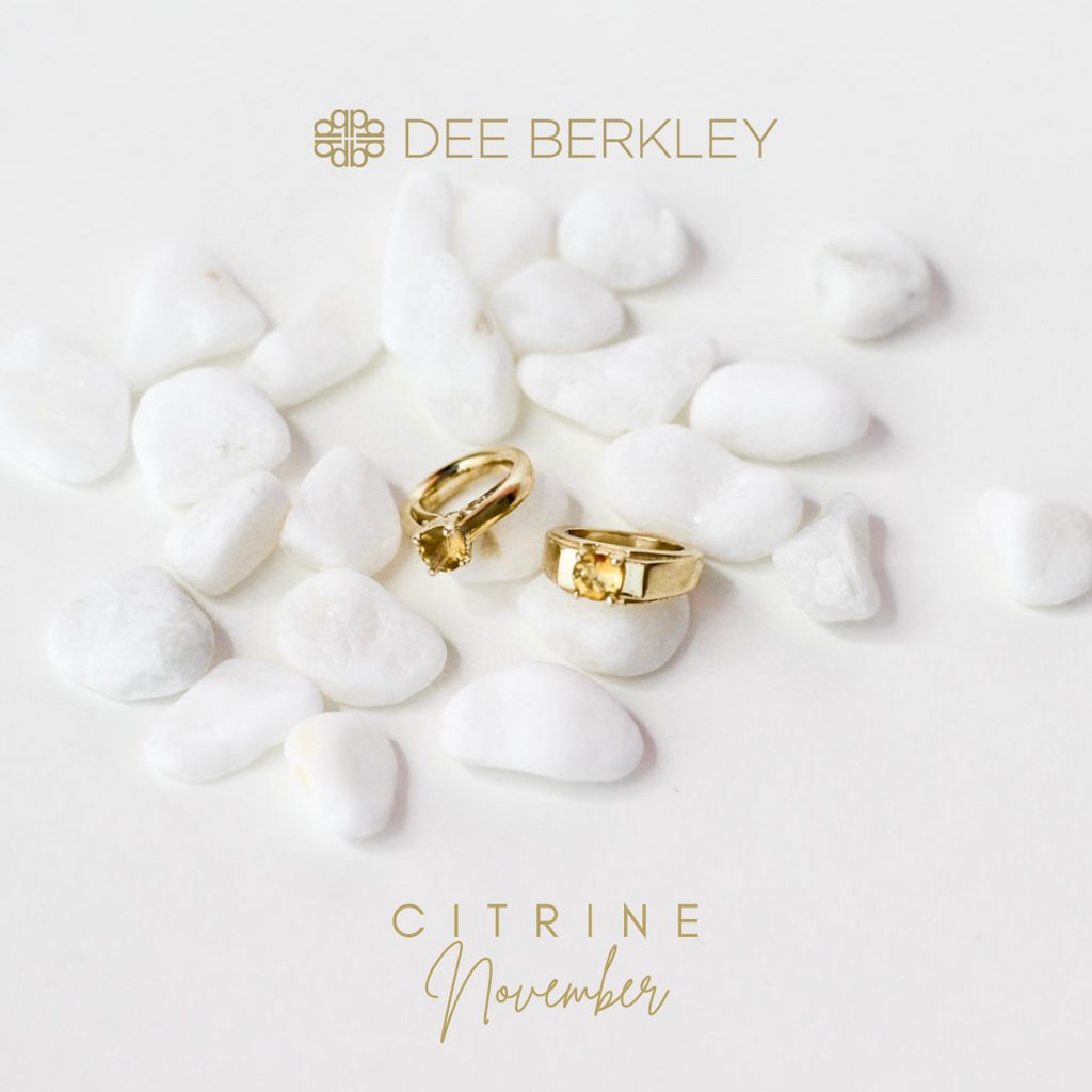 Citrine charm on white stones.