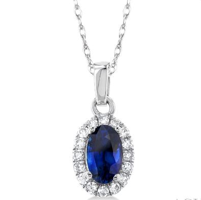 Oval sapphire pendant with diamond halo.