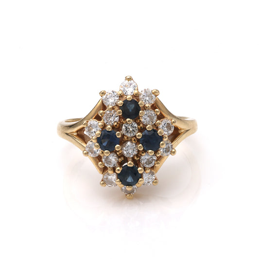 Yellow gold ring with sapphires and diamonds.