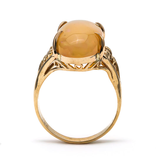 14K yellow gold ring with cabochon opal.