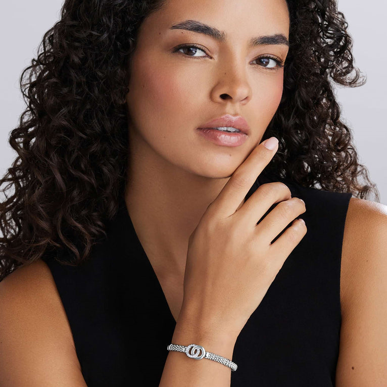 Sterling silver bracelet with round diamonds.