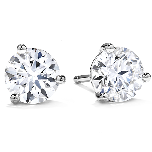 Round diamond stud earrings in white gold.