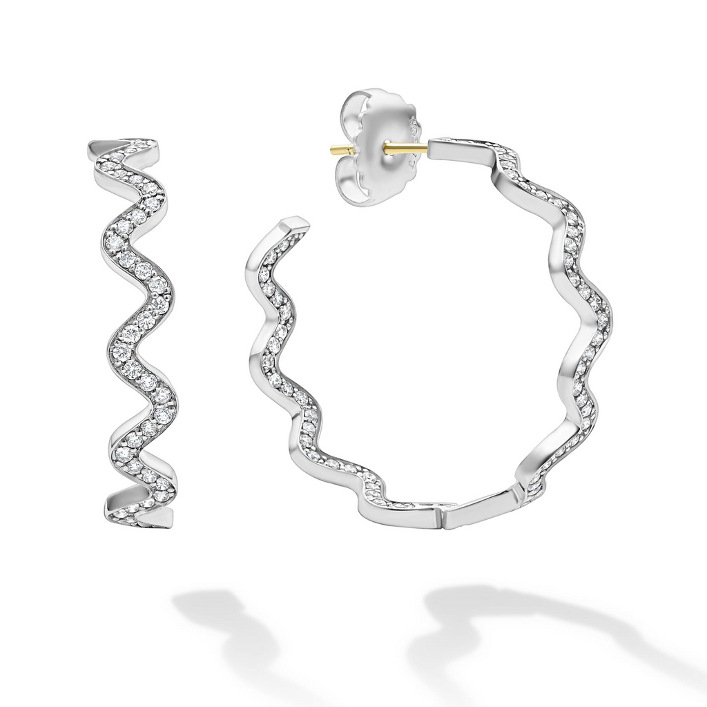 Wavy hoop earrings with round diamonds.