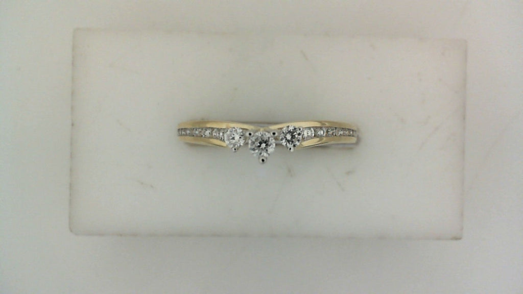 Yellow gold band with round diamonds.