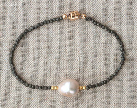 Gold-filled bracelet with pearl and black beads.
