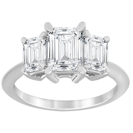 Three-stone emerald-cut diamond ring.