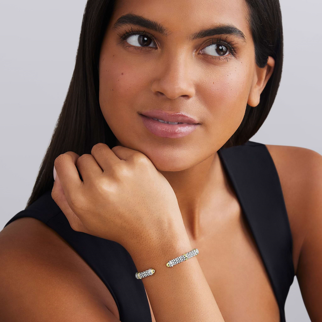 Sterling silver cuff bracelet, yellow accents.