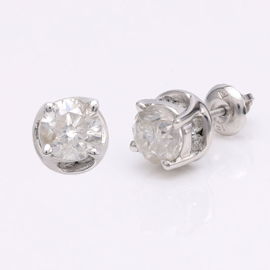 14K white gold diamond stud earrings.