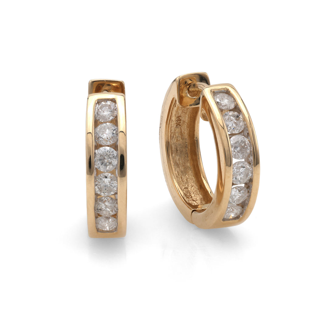 14K yellow gold huggie diamond earrings.