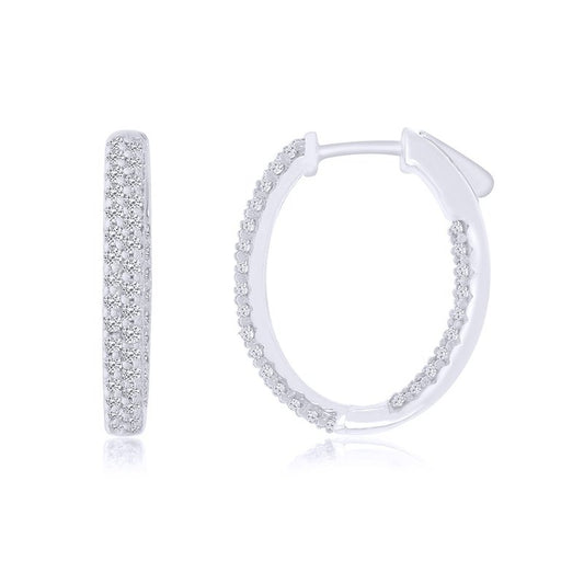 Oval hoop earrings with round diamonds.