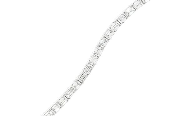 14K white gold bracelet with emerald-cut diamonds.