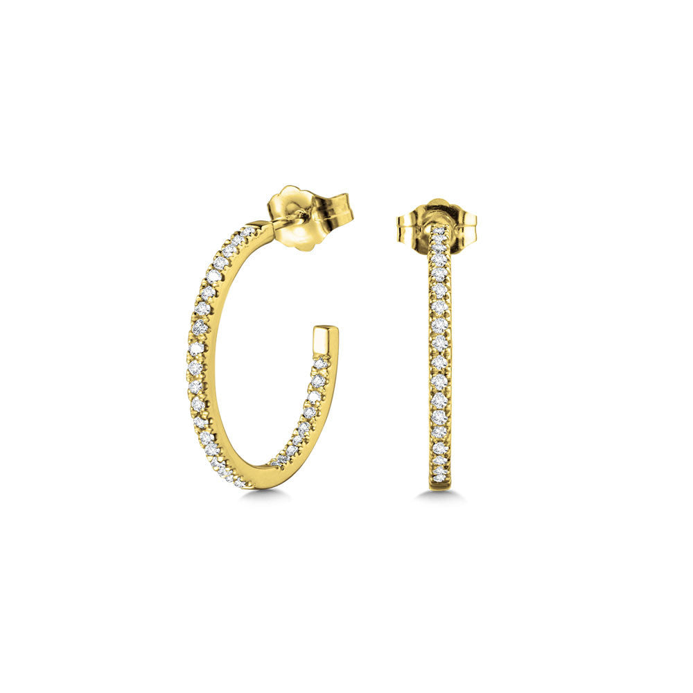 Small yellow gold hoops with round diamonds.