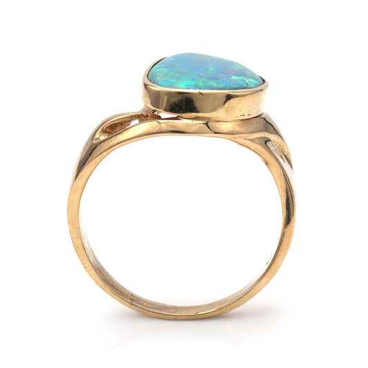 Opal ring in 14K yellow gold setting.