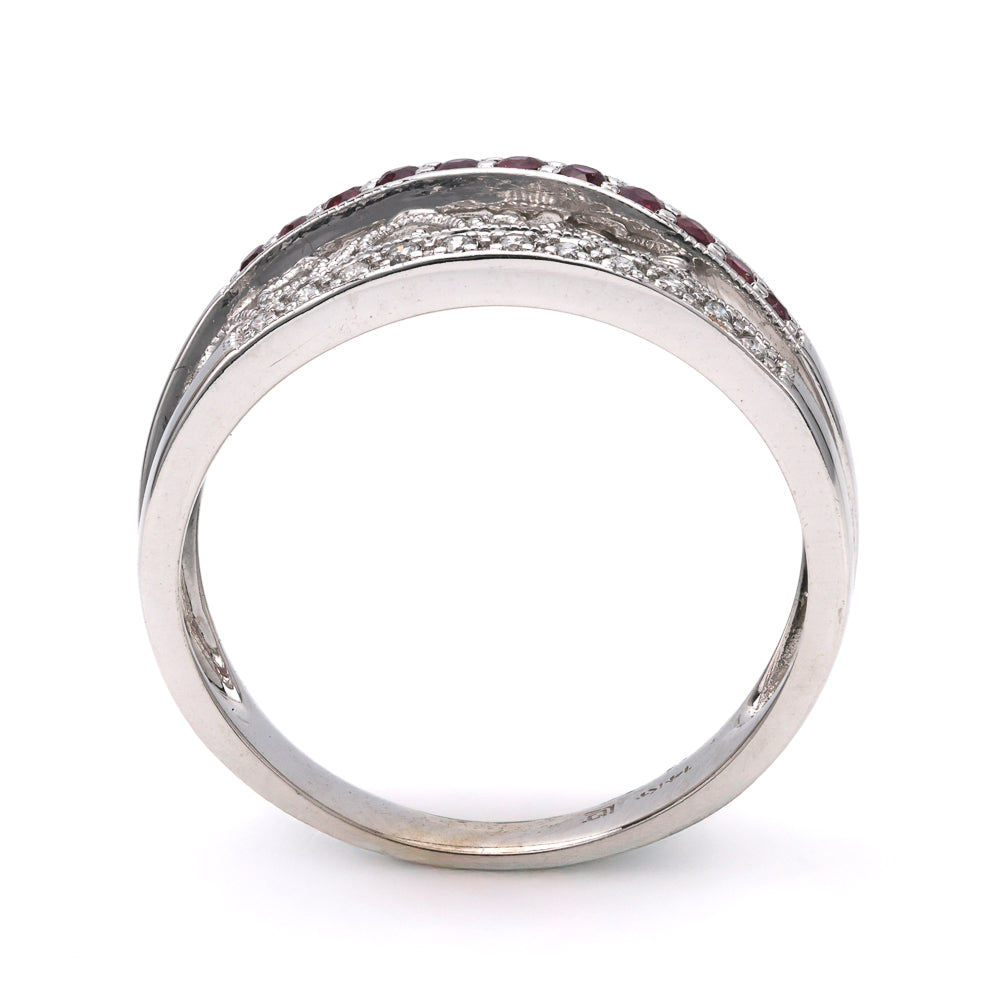 14K white gold ring with rubies.