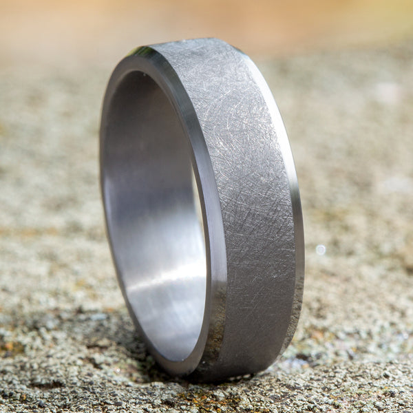 Tantalum grey carved band, matte finish.