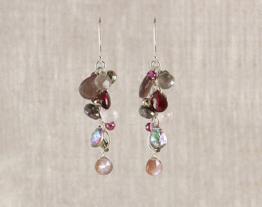 Sterling silver earrings with colorful gemstones.