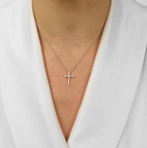 Sterling silver cross necklace with diamonds.