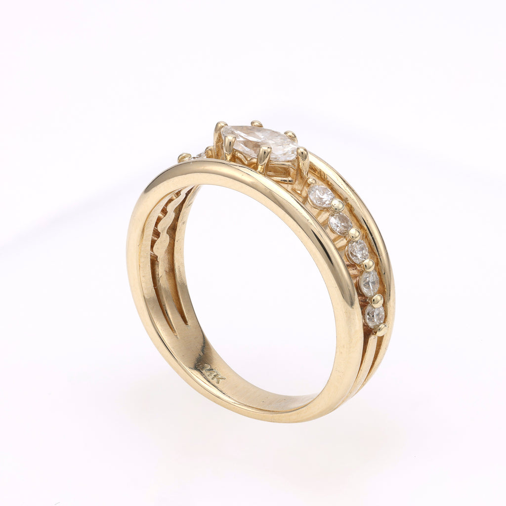 14K yellow gold ring with marquise diamond.
