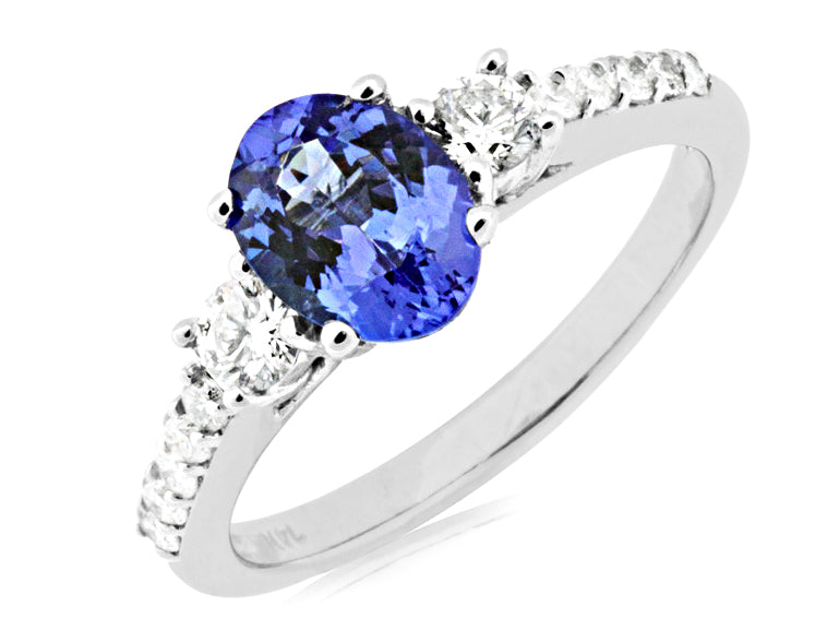 Oval tanzanite ring with diamond accents.